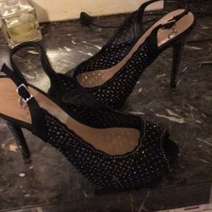 Sparkling black heels a heart on the bottom size 8
